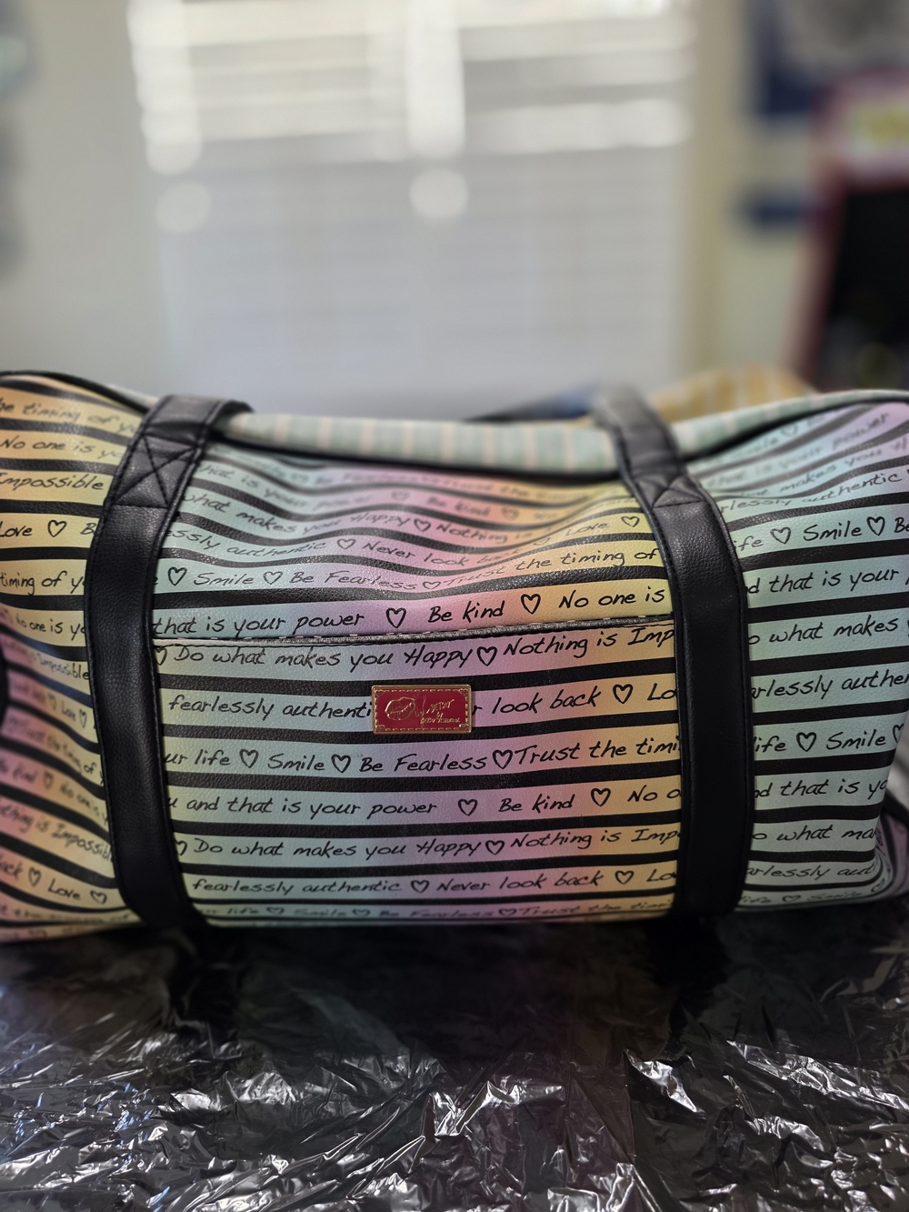 Oroton Pastel Rainbow Stripe Canvas Holdall with Black Trim
